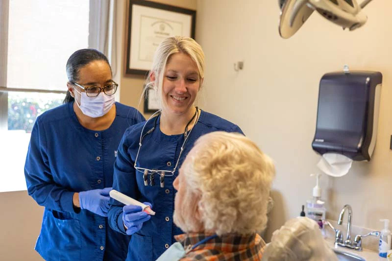 patient getting dentures at Midtown Dental