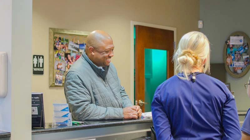 patient scheduling his next dental appointment at Midtown Dental